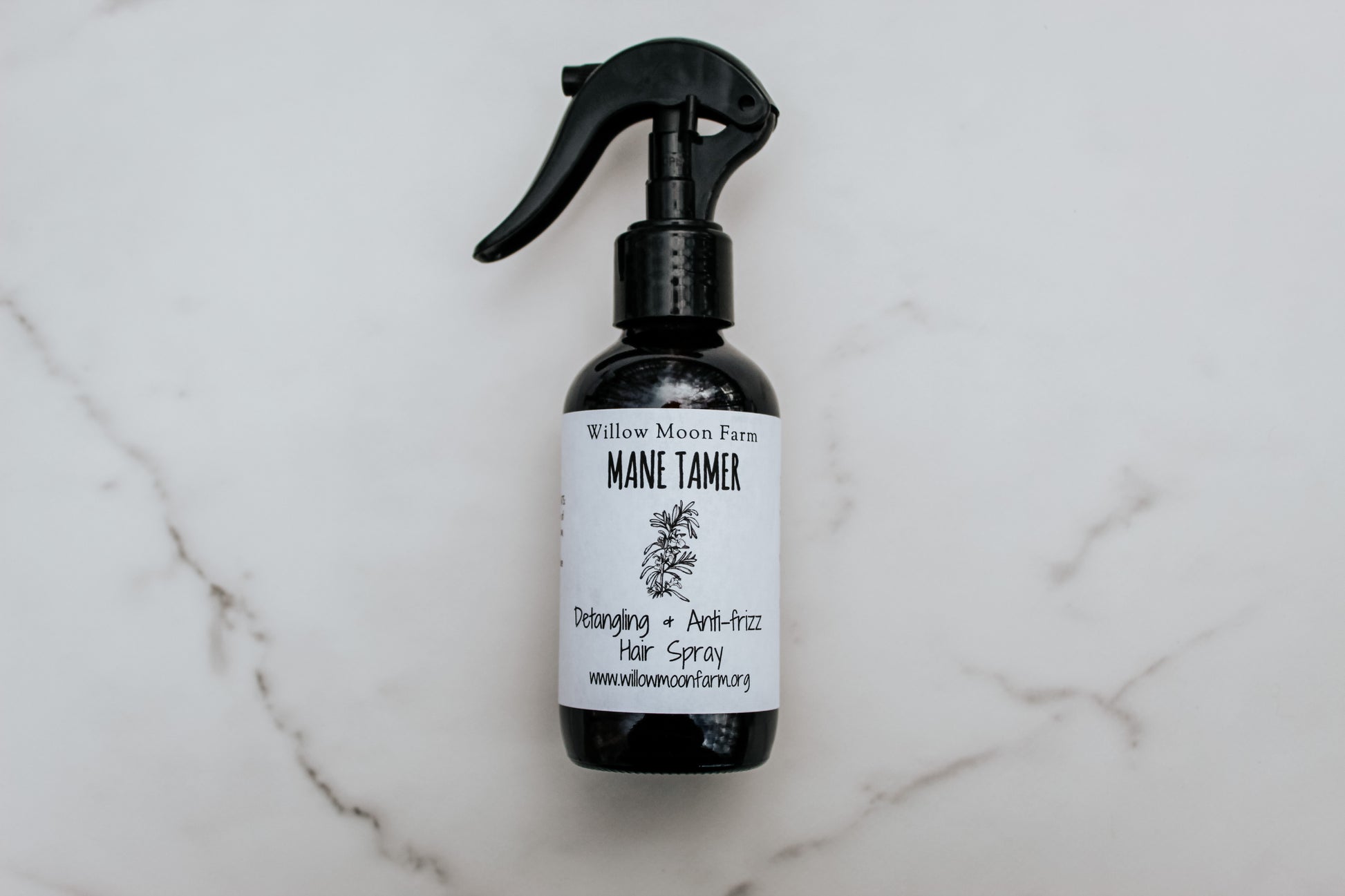 Organic herbal hair spray for detangling and reducing frizz, made with regenerative herbs and aloe vera